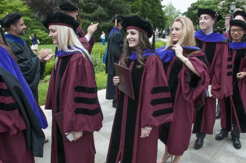 The students said they were thrilled to be new alumni. 