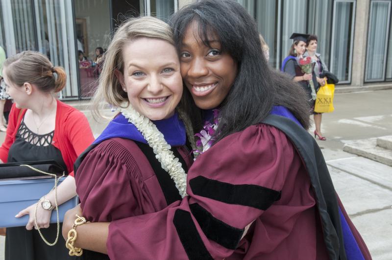 The mood was jubilant as graduates posed on the reflecting pool. 