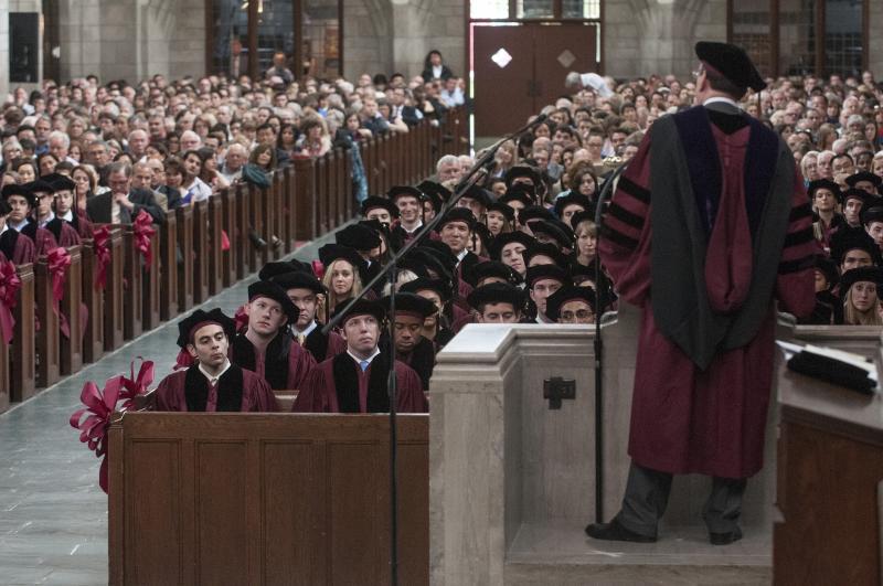 The law graduates moved to Rockefeller Chapel for their hooding ceremony.