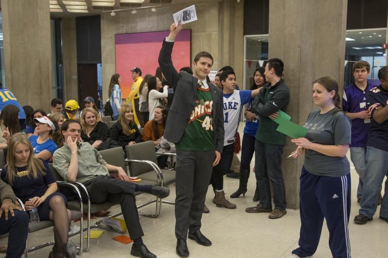 Michael Lanahan, '14, mixes formalwear with a basketball jersey.