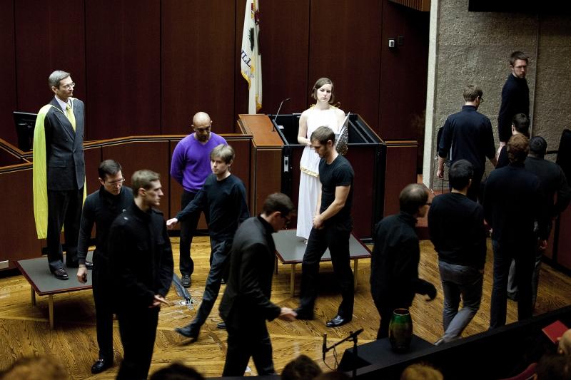 Professor Tom Miles as Apollo, with Daniel Abebe as Orestes and the Furies. Professor Tom Miles as Apollo, with Daniel Abebe as Orestes and the Furies.
