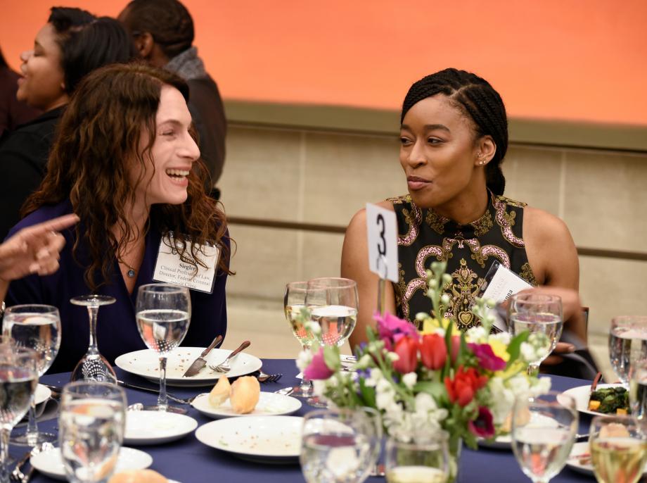 Professor Alison Siegler, the Director of the Law School's Federal Criminal Justice Clinic, chats with Deanna Hall, '20. 