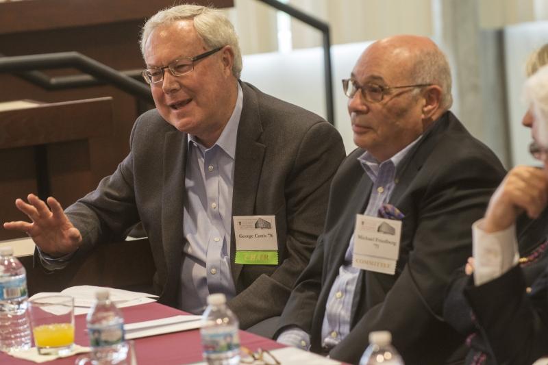 Alumni attended a panel discussion with fellow graduates who have navigated transitions in their careers. Two of the panelists, George Curtis, ’76, and Michael Friedberg, ’71, are shown. Alumni attended a panel discussion with fellow graduates who have navigated transitions in their careers. Two of the panelists, George Curtis, ’76, and Michael Friedberg, ’71, are shown.