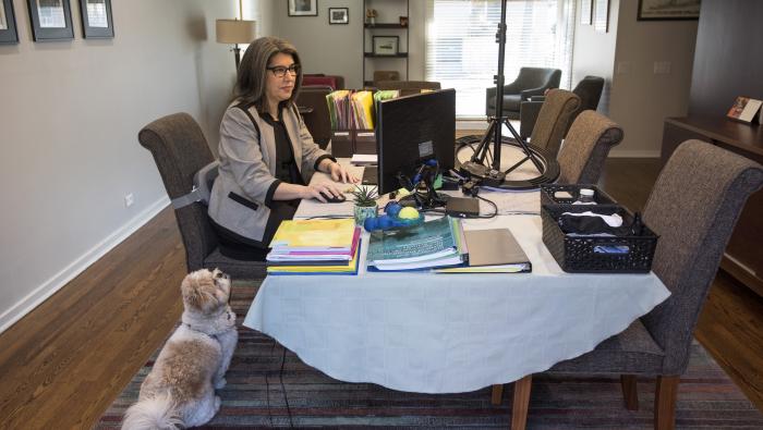 Associate Dean for Career Services Lois Casaleggi working in her dining room/home office last fall.