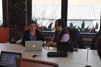 Two students interacting in classroom