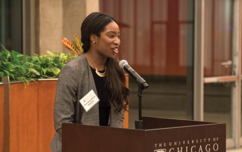 Oluwafunmilayo Osinubi speaks from behind a podium