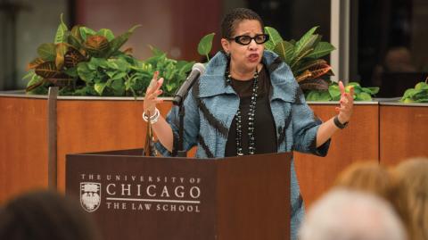 Judge Ann C. Williams gesticulates behind a podium