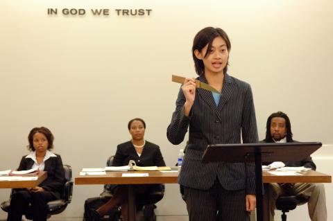 Daphne Hsu, '06, practices her courtroom skills at the workshop's mock trial in 2005.