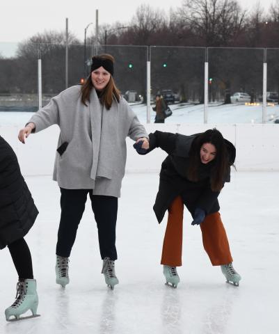 D'Amore (left) ice skating on the Midway with Nicole Briones, '22.