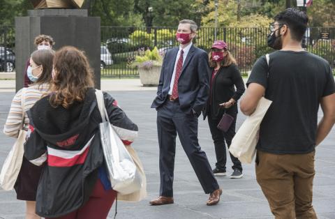 Dean Thomas J. Miles greets new students during Orientation.