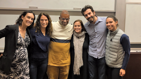 Client Leslie Mayfield poses with Judith Miller, Alison Siegler, Erica Zunkel, David Silberthau, and Alex Aparicio at Law School event