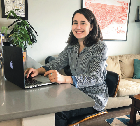 Brenna Darling sits at her computer at home.