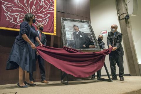 (From left): Professor from Practice Sharon Fairley, Dean Thomas J. Miles, Professor William Hubbard, and Professor Richard McAdams unveil the Dickerson portrait.