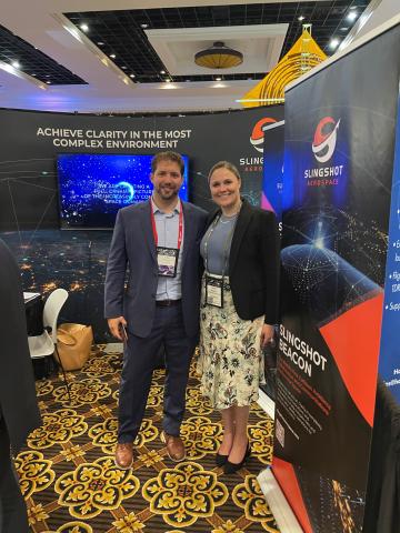 Highfill in 2021 at the National Space Symposium in Colorado Springs with Jerry McIntyre, MBA '21.