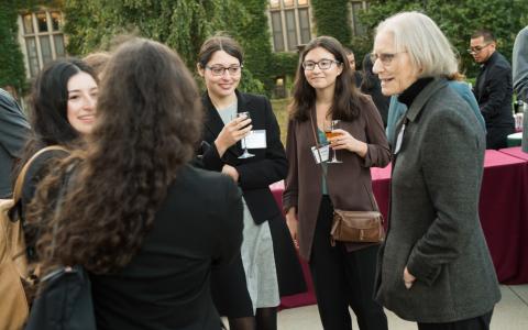 Julie Roin with several students at the cocktail hour that preceded dinner.
