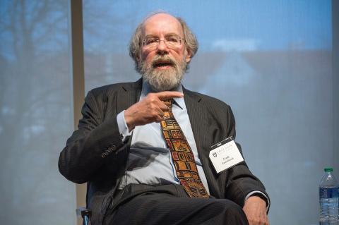 Frank Easterbrook, seated, makes a point