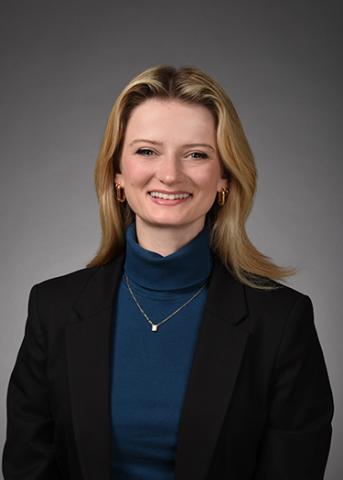Headshot of Michaela Fleischer smiling at the camera