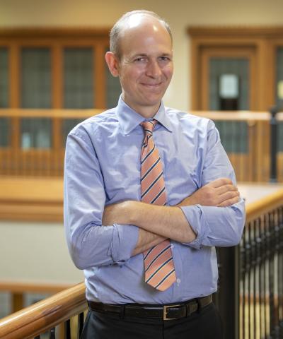 Professor Samuel Bray, standing with arms folded