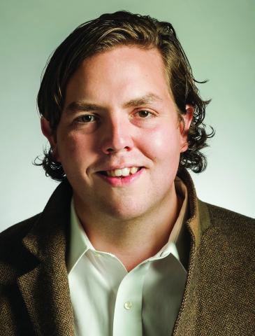 Headshot of a man smiling