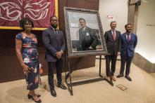 Gallery Guichard co-owner Frances Guichard, artist Shawn Michael Warren, Andre Guichard, Dean Thomas J. Miles,Gallery Guichard co-owner with the painting of Earl B. Dickerson.