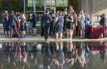 Graduating students dinner cocktail hour by the reflecting pool