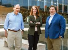 3 law professors standing in front of the Law School