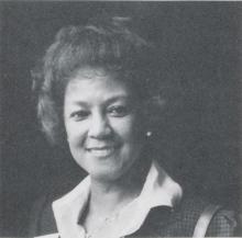 Headshot of a woman smiling and looking at the camera