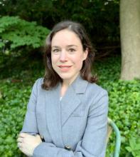 Mara Revkin standing outside 