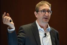 Jacob Goldin gestures as he speaks