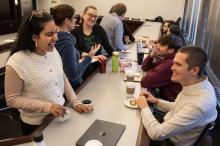 Students at breakfast event chatting