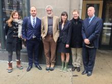 Students standing with Craig Futterman and Jamie Kalven