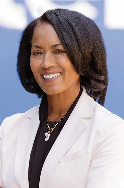 April Miller Boise wearing white suit