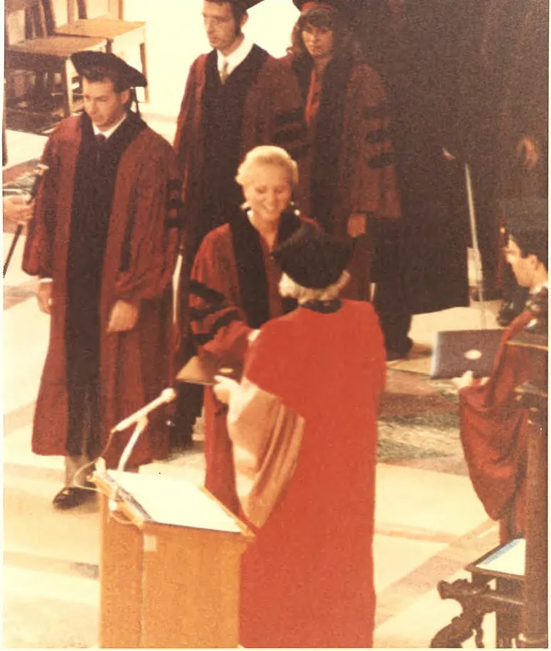 A photo of Miller graduating from the University of Chicago Law School.