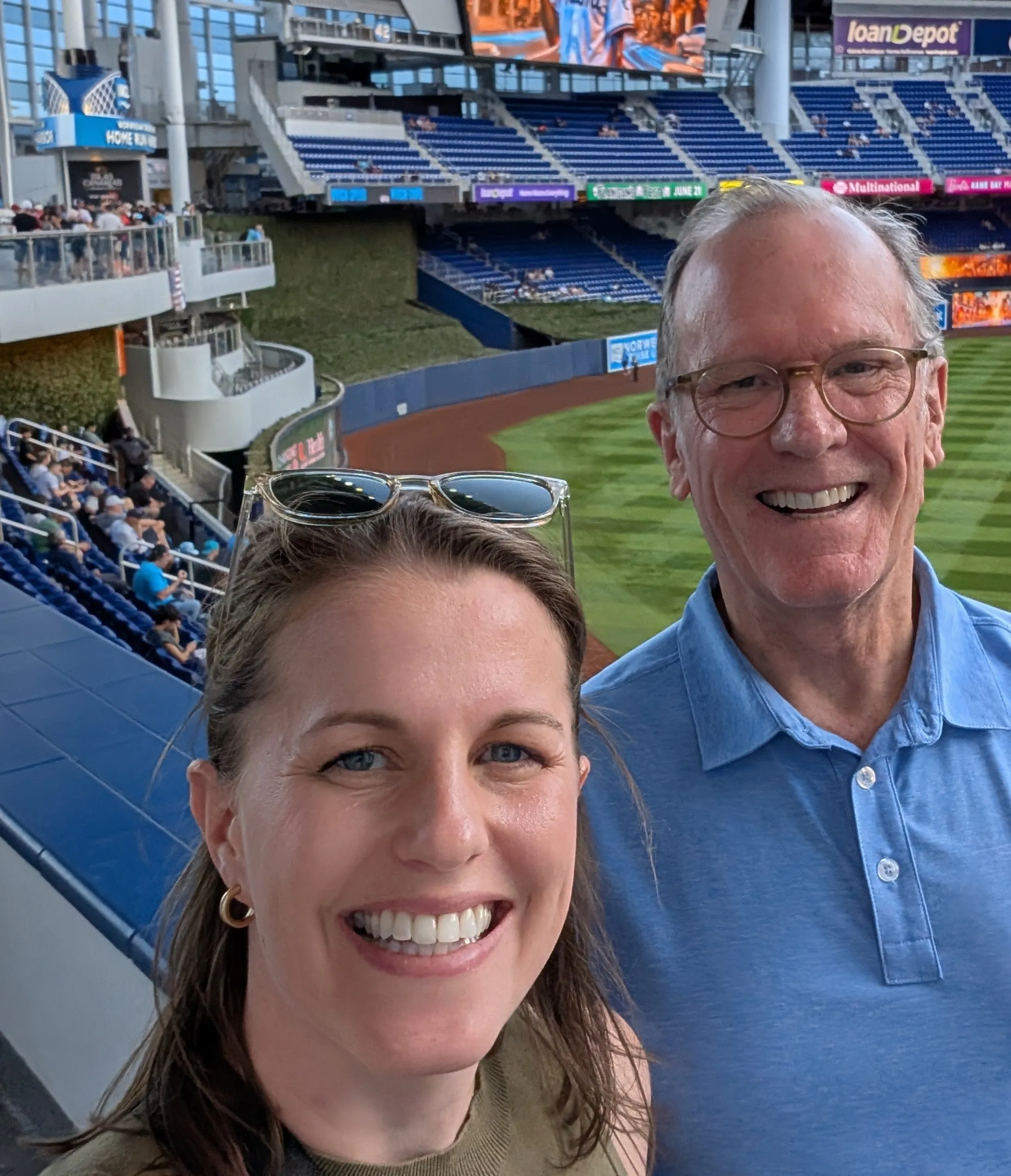 A photo of Jim Parsons and his daughter at a baseball game in Miami.